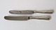 Karstens Antik 
presents: 
Cohr 
Double fluted 
knife in silver 
and steel 20.5 
cm.