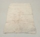 Scandinavian textile designer.
Rya carpet in pure wool.