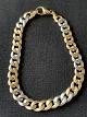 Panzer gold bracelet in 14 carat red and white gold, stamped 585 HIS and with carabiner clasp.