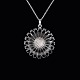Bestik.dk 
presents: 
Georg 
Jensen. 
Sterling Silver 
Daisy Pendant 
with black 
Enamel 33mm.