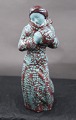 Michael Andersen Danish ceramics, Bornholm, in the 

series seasons. Young girl with muff, or winter