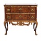 Aabenraa 
Antikvitetshandel 
presents: 
Padouk 
veneered and 
partly gilt 
marble top 
commode made by 
the manufacture 
...