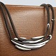 Anette Kræn for Georg Jensen; Halssmykke i læder med sterling sølv #310