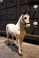 K&Co. presents: 
Decorative 
Swedish 19th 
century wooden 
horse in 
off-white color 
and with a 
super fine 
patina...