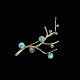 Bestik.dk 
presents: 
Karen 
Strand 
1924-2000. 18k 
Gold Brooch 
with Turquoise.
