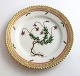 Lundin Antique 
presents: 
Royal 
Copenhagen, 
Flora Danica. 
Cake plate. 
Design # 3552. 
Diameter 14 cm. 
(1 ...