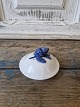 Karstens Antik 
presents: 
Royal 
Copenhagen Blue 
Flower teapot 
lid no. 8707