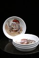 K&Co. presents: 
Royal 
Copenhagen 
glass / bottle 
tray in 
porcelain with 
various 
Christmas 
motifs of a 
gnome and ...