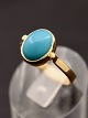 Middelfart 
Antik presents: 
14 carat 
gold ring with 
cabochon cut 
turquoise