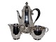 Georg Jensen silver
Rare coffeepot, creamer and sugar bowl with 
grapes from 1933-1944