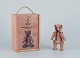 L'Art presents: 
Kay 
Bojesen, Danish 
designer.
Bear crafted 
from various 
types of wood.