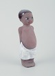 Mari Simmulson 
for Upsala 
Ekeby.
Figur af barn. 
...