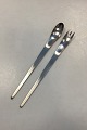 Danam Antik 
presents: 
Arne 
Jacobsen for 
Anton Michelsen 
Stainless Salad 
Set, long
