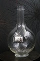 K&Co. presents: 
Georg 
Jensen Gognac 
sign in 
sterling 
silver. 
Stamped. 
3.8x3.8cm.