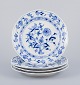 L'Art presents: 
Meissen, 
Germany.
A set of four 
"Blue Onion" 
pattern 
porcelain 
plates.