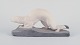 L'Art presents: 
Sevres, 
France. 
Sculpture of a 
mink in 
earthenware.