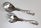 Lundin Antique 
præsenterer: 
Georg 
Jensen. 
Sølvbestik 
(925). 
Pyntebestik no. 
42. 
Serveingssæt. 
Længde 15 cm.