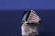 Herrering i 18 
karat guld, med 
sort onyx. 
Stemplet 750. 
...