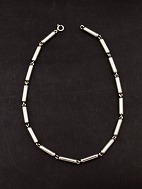 N E From sterling silver necklace