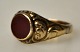 Pegasus – Kunst 
- Antik - 
Design 
presents: 
Antique 14 
carat red gold 
ring with 
carnelian, 19th 
century.