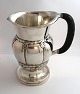 Lundin Antique 
presents: 
Georg 
Jensen. Design 
7. Silver 
Pitcher. 
Sterling (925). 
Design; Georg 
Jensen. Height 
...