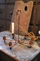 K&Co. presents: 
Old 
swedish wrought 
iron 
candlestick for 
6 candles...