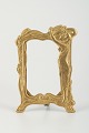 Elegant Art 
Nouveau 
messingramme 
med 
kvindefigur, 
ca. 1900.