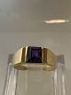 Antik Huset 
præsenterer: 
14 karat 
guld, Dame ring 
med en amatyst.
Ring størrelse 
52.
