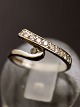 Middelfart 
Antik presents: 
14 carat 
white gold ring 
size 48 with 
several 
diamonds