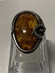 Antik Huset 
presents: 
Vintage 
Ladies Ring in 
Sterling Silver 
with Amber.
Size. 56.