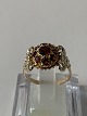 Antik Huset 
presents: 
Ladies' 
ring in 14 
carat gold with 
red stones and 
beautiful 
ornamentation. 
Size 58, ...