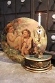K&Co. presents: 
Old French 
1800s oil 
painting on 
canvas with a 
motif of 2 
small angels...