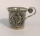 Lundin Antique 
presents: 
Russia. 
Silver cup with 
handle (84). 
Height 5 cm. 
Diameter 5.5 
cm. Produced 
1835
