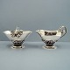 Antik 
Damgaard-
Lauritsen 
presents: 
Georg 
Jensen; A set 
with sugar bowl 
and creamer of 
sterling 
silver, No 235 
A