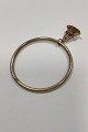 Gold-plated 
metal Armring 
bangle with 
pendant