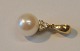 14 carat gold 
pendant with 
pearl and three 
cut diamonds, 
...