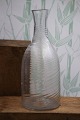 K&Co. presents: 
Antique, 
Swedish carafe 
in twisted 
mouth-blown 
glass...
