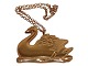 Antik K 
præsenterer: 
Georg 
Jensen Golden 
Christmas
Ornament Svane