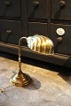 K&Co. presents: 
Old table 
lamp in brass 
with clam 
shaped 
lampshade...