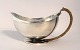 Lundin Antique 
presents: 
Georg 
Jensen. Sauce 
bowl with 
handle. Harald 
Nielsen. Model 
761. Length 17 
cm. Height ...