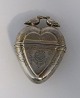 Lundin Antique 
presents: 
Heart-
shaped silver 
vinaigrette. 
Height 6 cm. 
Not stamped.