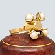 Antik 
Damgaard-
Lauritsen 
presents: 
Jens Asby; 
Ring of 14k 
gold set with 
pearls