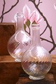 K&Co. presents: 
Antique 
Swedish wine / 
water carafe in 
mouth-blown 
twisted 
glass...