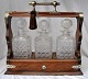 English 
tantalus with 
three crystal 
decanters, 19th 
century