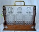 English 
tantalus with 
three 
decanters, 19th 
century
