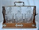 English 
tantalus with 
three 
decanters, 19th 
century.