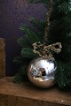 K&Co. presents: 
Swedish 
19th century 
large Christmas 
bauble in 
Mercury Glass 
with remains of 
painted 
flowers. ...