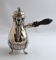 Lundin Antique 
presents: 
A. 
Michelsen. 
Silver cream 
jug with handle 
(830). Height 
13.5 cm. 
Produced 1887.