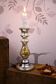 K&Co. presents: 
Antique 
French 19th 
century 
candlestick in 
Mercury silver 
glass with 
remnants of 
painted floral 
...