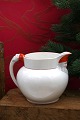 K&Co. presents: 
Old 
Swedish 
Christmas jug 
in faience with 
elves on the 
pouring spout 
and on the 
handle...